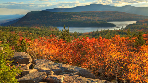 Afternoon sun on sunset rock in the Autumn, overlooking North-South Lake in the Catskills Mountains of New York. (HDR).' (lightphoto / iStock / Getty Images Plus)