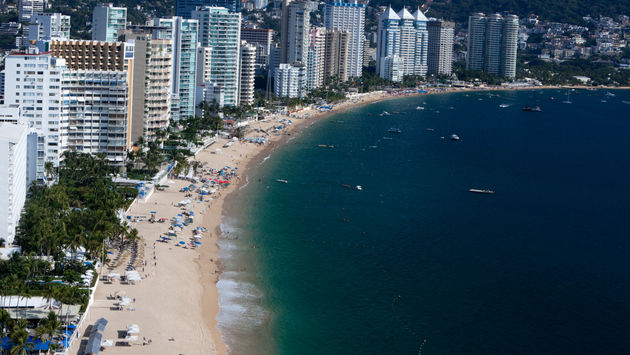 Overlooking view of Acapulco Bay, Mexico. (photo via Aneese/iStock/Getty Images Plus)