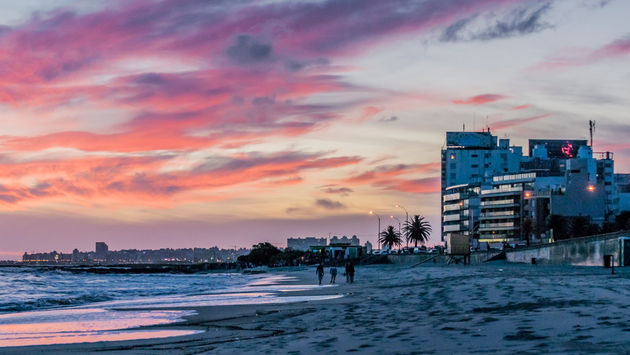 Sunset scene of beach and coastline of Montevideo, Uruguay (Rudimencial / iStock / Getty Images Plus)
