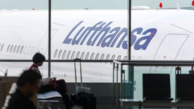 Lufthansa Airbus A340 airplane through a window