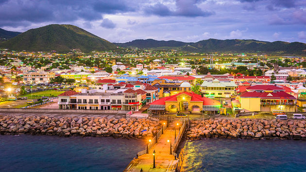 Basseterre, St. Kitts and Nevis town skyline at the port. (Photo via Sean Pavone / iStock / Getty Images Plus)