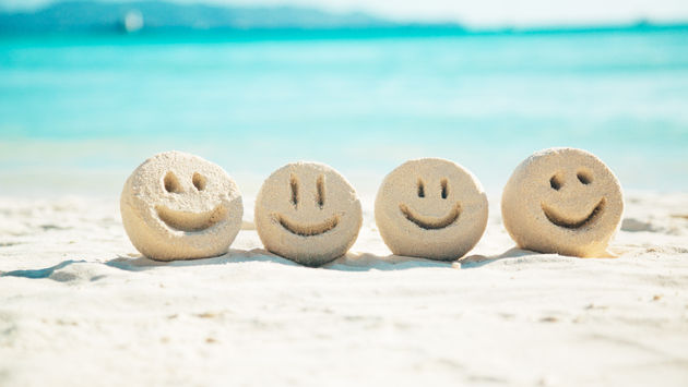 Smiley faces in the sand