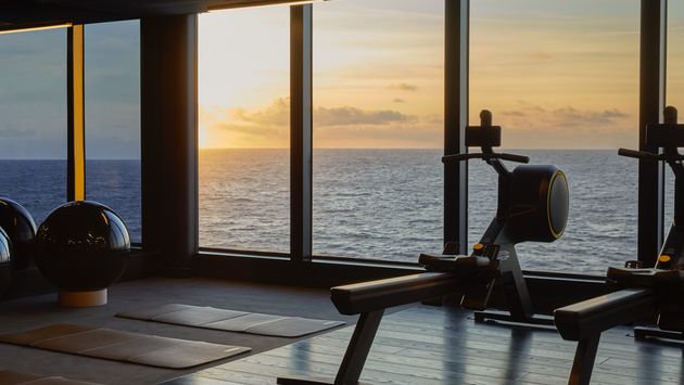Burn gym with a view of the ocean and sunset.