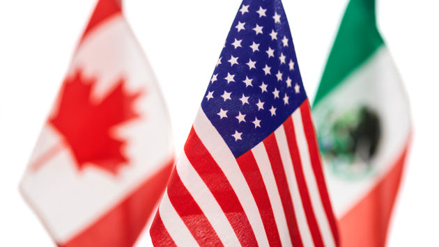 Flags of U.S., Canada and Mexico.
