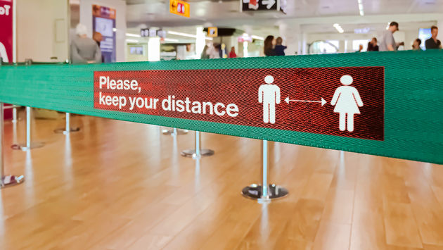 Social distance sign at airport