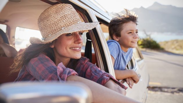 Mother And Children Relaxing In Car During Road Trip (Photo via monkeybusinessimages / iStock / Getty Images Plus)