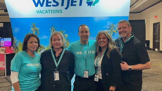 WestJet Vacations staff at travel trade expo