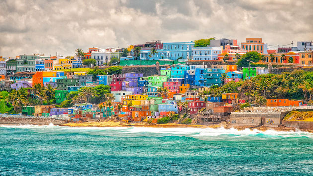 Colorful stacked houses overlooking the sea in Puerto Rico.