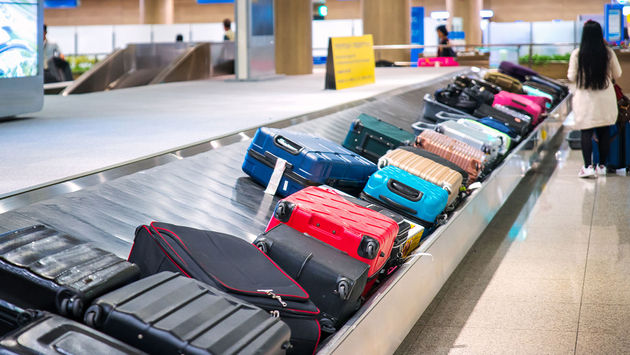 Travelers, waiting, airport, luggage, baggage, bags, checked, conveyor belt, carousel, passengers