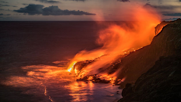 Lava flows into the Pacific Ocean from the Kilauea volcano, along the south coast of the Big Island of Hawaii.