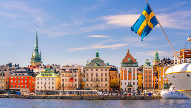 Old Town, waterfront, docks, Stockholm, Sweden, flag