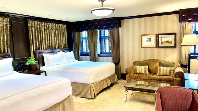 A cozy room at The American Club Carriage House in Destination Kohler