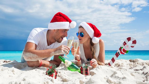 Travelers at the beach for the holidays