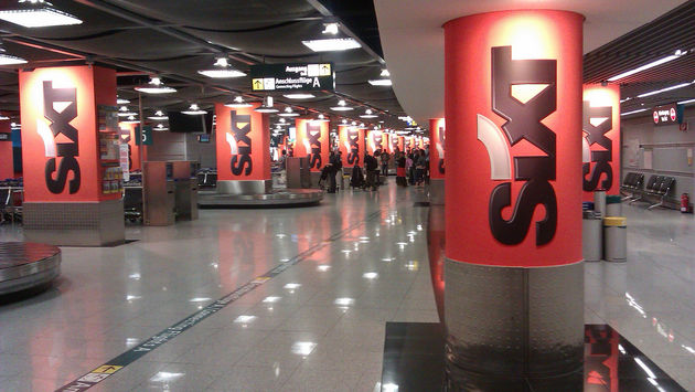 Sixt rental car logos in an airport