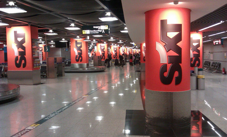 Sixt rental car logos in an airport