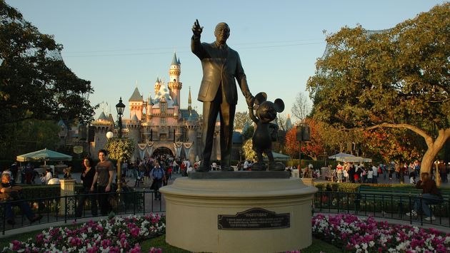 The famed statue of Walt Disney and MIckey Mouse at Disneyland