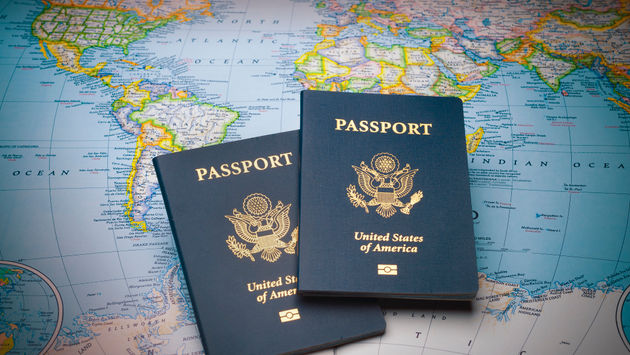 U.S. passports on a global map.