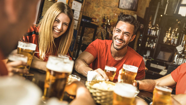 Drinking beer at brewery bar restaurant (Photo via ViewApart / iStock / Getty Images Plus)