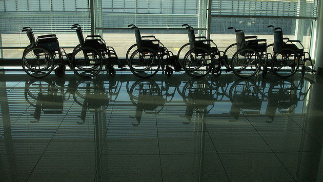 A collection of airport wheelchairs