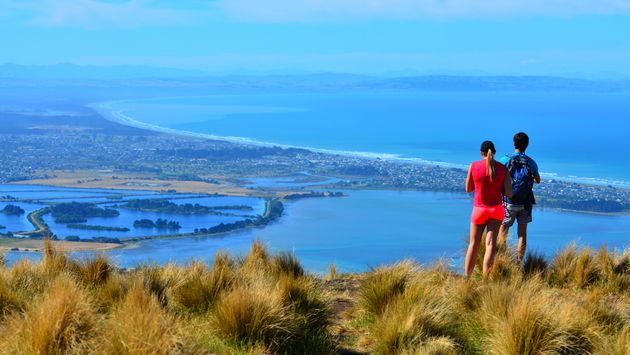 Couple look at the landscape view of Christchurch, New Zealand