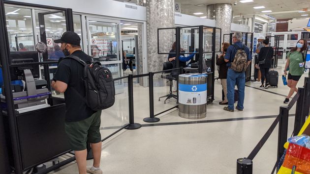 Travelers at TSA security