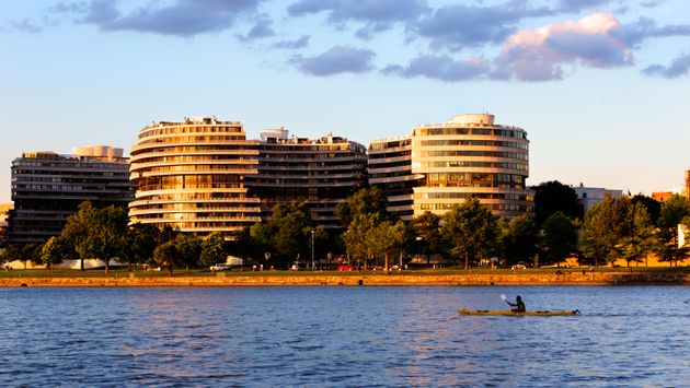 The Watergate Hotel in Washington, DC with the Potomac River in the foreground