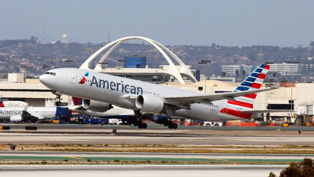 An American Airlines Boeing 777 taking off from Los Angeles International Airport