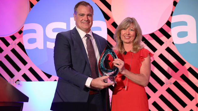 Kristin Karst accepts the award at ASTA Global Convention 2021.