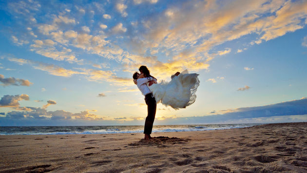 Bride and groom destination wedding on the beach