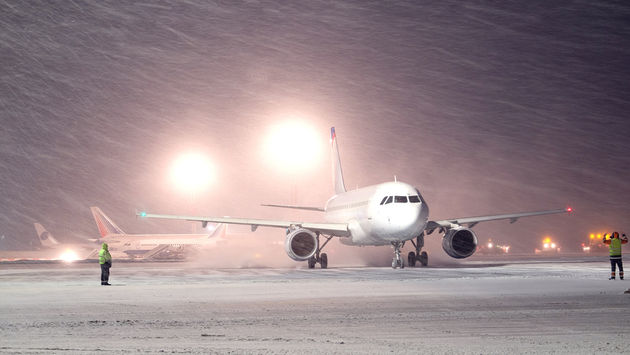 Airport and airplanes in a blizzard