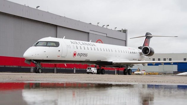 An Air Canada Express CRJ900 aircraft, operated by Jazz Aviation LP, in the new Air Canada Express livery.