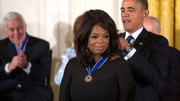 President Barack Obama awards the 2013 Presidential Medal of Freedom to Oprah Winfrey during a ceremony in the East Room of the White House, Nov. 20, 2013