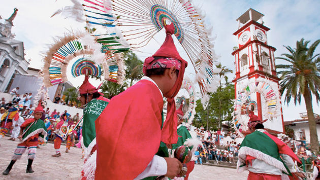 The inhabitants of Cuetzalan, in the state of Puebla, dance the Flyers for their visitors.  (Photo via Mexican Ministry of Tourism).