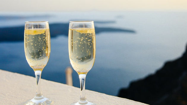 Champagne glass, luxury travel, affluent travel