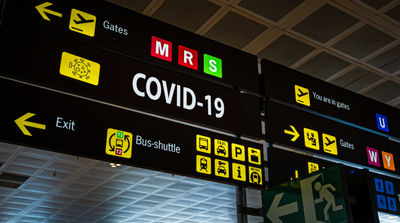 Airport information panel emblazoned with 