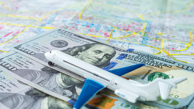 airline airfare plane pricing cost cash bill money dollar