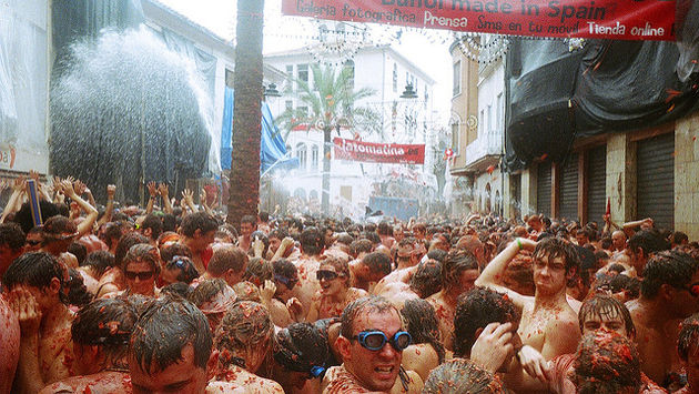 The famous La Tomatina tomato fight takes place in Buñol, Spain every year