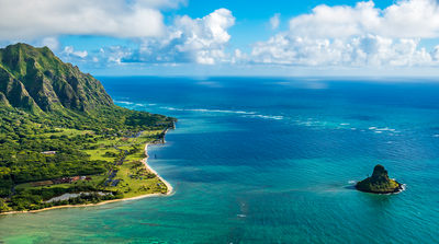 Aerial view of Kualoa Point and Chinamans Hat, Kaneohe Bay (PHOTO: Photo via PB57photos / iStock / Getty Images Plus)