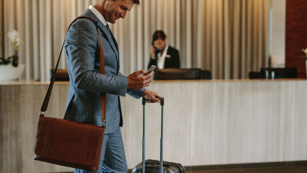 Businessman arriving at hotel lobby