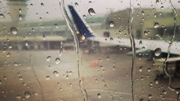 Airplanes wait out the rain at Orlando International Airport