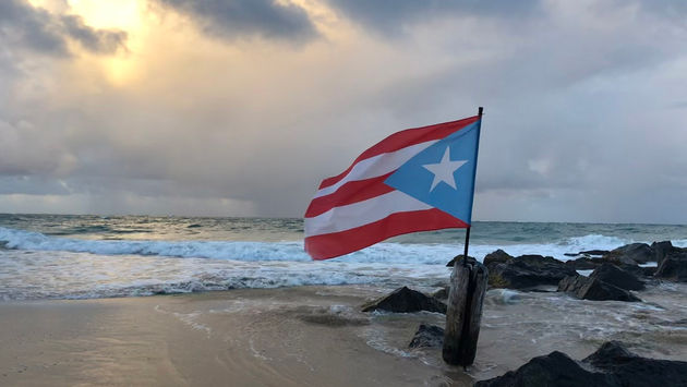 Puerto Rico flag on beach