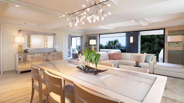 Interior of suite at Espacio in Waikiki with white accents and modern furnishings