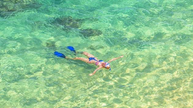 Female snorkeling in Hawaii