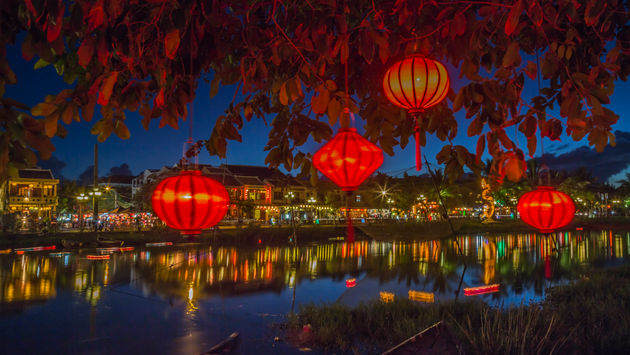 Lanterns and colorful lights on river in Hoi An, Vietnam