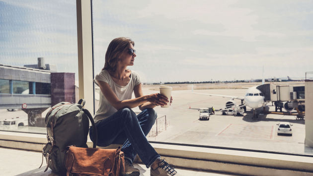 Young woman waiting for a plane