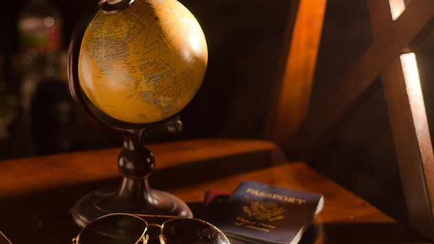 Accoutrements of travel and a globe