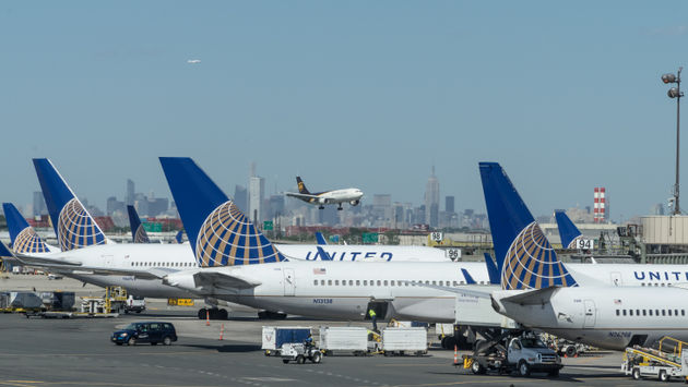 United Airlines planes parked at airport.