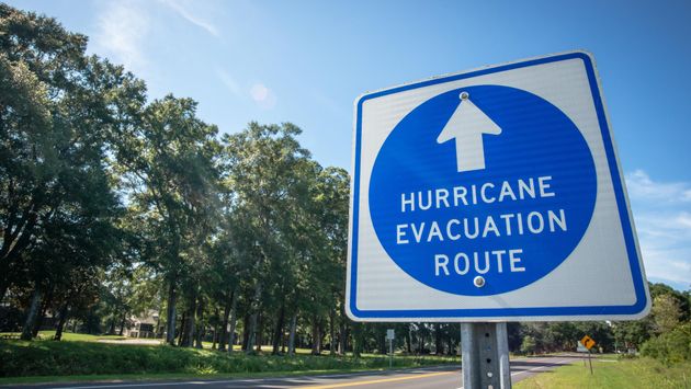 A sign directs hurricane evacuees to safety