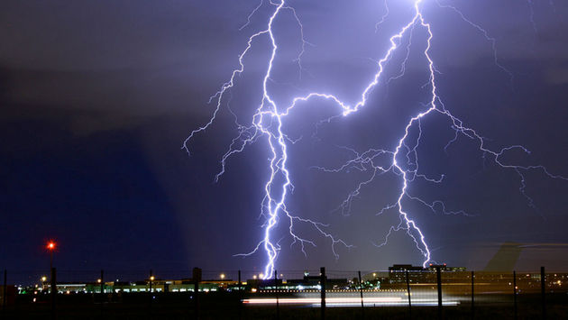 Lightning strikes over Denver’s Centennial Airport.
