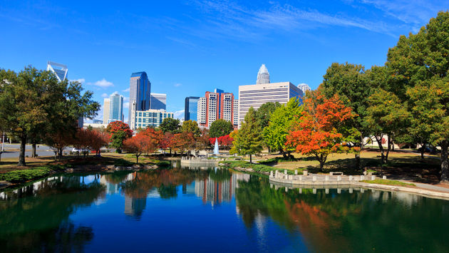 Charlotte skyline from Marshall Park in the fall. The new Skye condos are in the middle. (Photo via  JillLang / iStock / Getty Images Plus)